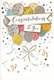 The scene captured here is of an uplifting congratulations card, its design radiating comfortable, joyful energy that would fit perfectly into a celebration in Rush Green. At the heart of the card is a rounded cluster of illustrated balloons, arranged like a cheerful bouquet in a soft metallic palette of gold, silver, champagne, pale blue, blush pink, and understated grey. Each balloon is carefully decorated: some glisten with scattered stars, others feature fine glittering stripes or tiny dot patterns that create a sense of texture and gentle sparkle, as if reflecting the light from a nearby window on Rush Green Road. Slender ribbons descend from the balloons, rendered in looping strokes of shimmering gold and silver, overlapping in a loose, rhythmic pattern that suggests movement and connection.

Across the centre of the balloons, a graceful banner stretches horizontally, gently curved and inscribed with the words "Congratulations To You" in flowing, calligraphic script that feels thoughtful and sincere. The surrounding background is calm and neutral, dusted with miniature metallic stars, confetti-style specks, and soft swirls that echo the excitement of a small party or family gathering near Romford. The card's overall mood is joyful yet composed, suitable for sharing congratulations on everything from exam successes and promotions to new homes or new beginnings. As someone experienced in matching cards with floral gifts, I can almost sense the smoothness of the card stock and the subtle raised shimmer of glitter under a fingertip. This design visually conveys heartfelt pride and genuine warmth, making it a beautiful finishing touch alongside a fresh bouquet delivered locally across Rush Green.